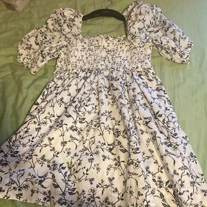 This dress is from American eagle and has flowers on it. It has been worn once